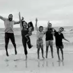 Jeff and Mandy Rose with Family on beach for vacation